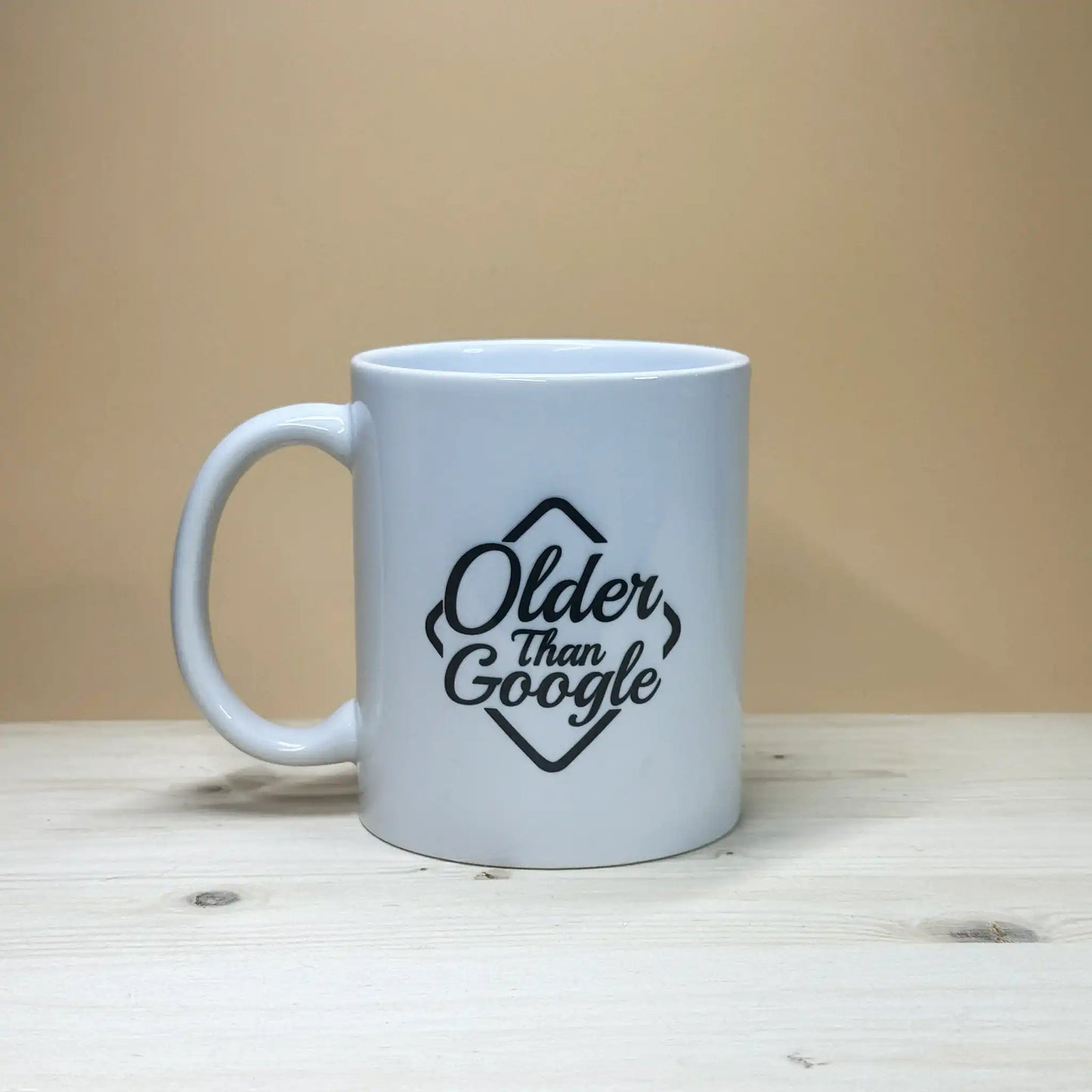 Sarcastic senior citizen gift idea 11oz coffee cup with bold older than google quote.
