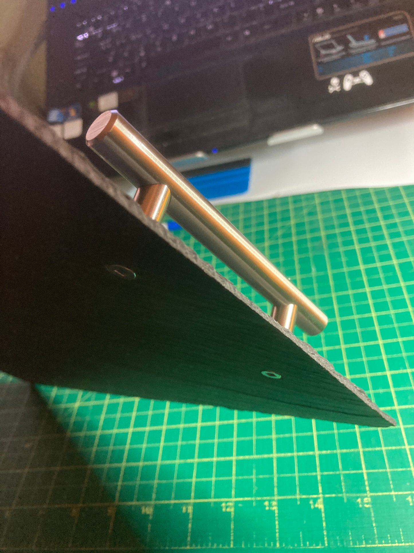Cheeseboard handles with countersunk screws.
