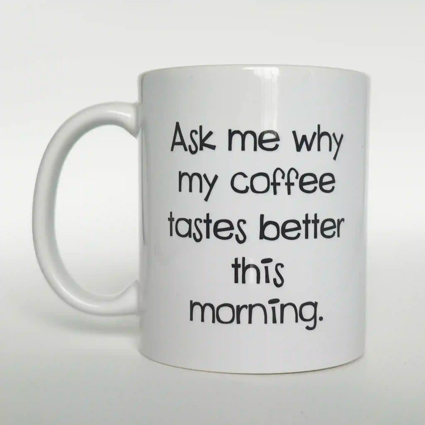 Back view of the "Daaaaaaa Yankees Lose!" mug with the text "Ask me why my coffee tastes better this morning."