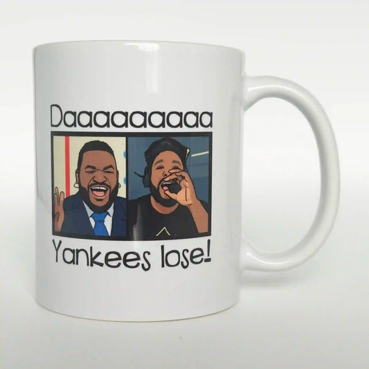 Custom coffee mug with a picture of Vladimir Guerrero Jr. and David Ortiz yelling, and the text "Daaaaaaa Yankees Lose!".