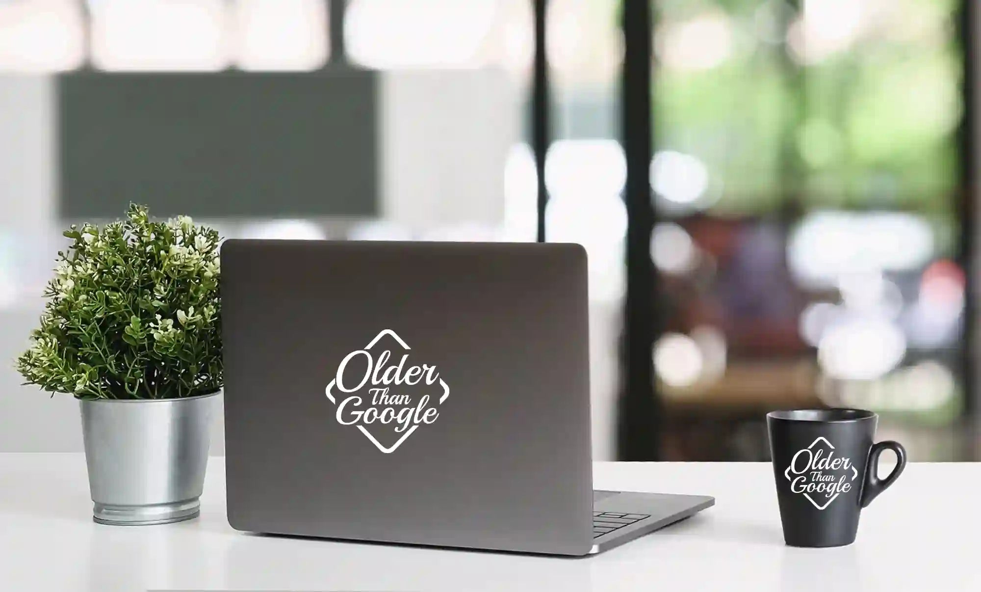 "Older Than Google" white vinyl decal on laptop lid | Retro computing sticker | Funny laptop accessory for macbook or pc