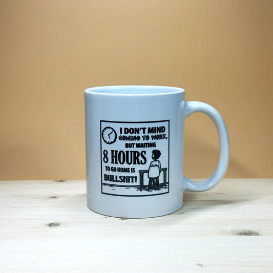 Side view of a glossy 11oz office humor mug with a large handle, showcasing a high-quality sublimation print of a funny work quote.