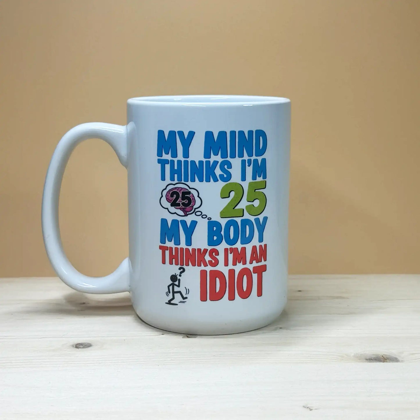 Over the hill 15oz. birthday gift mug for men and women with funny mind vs body quote.