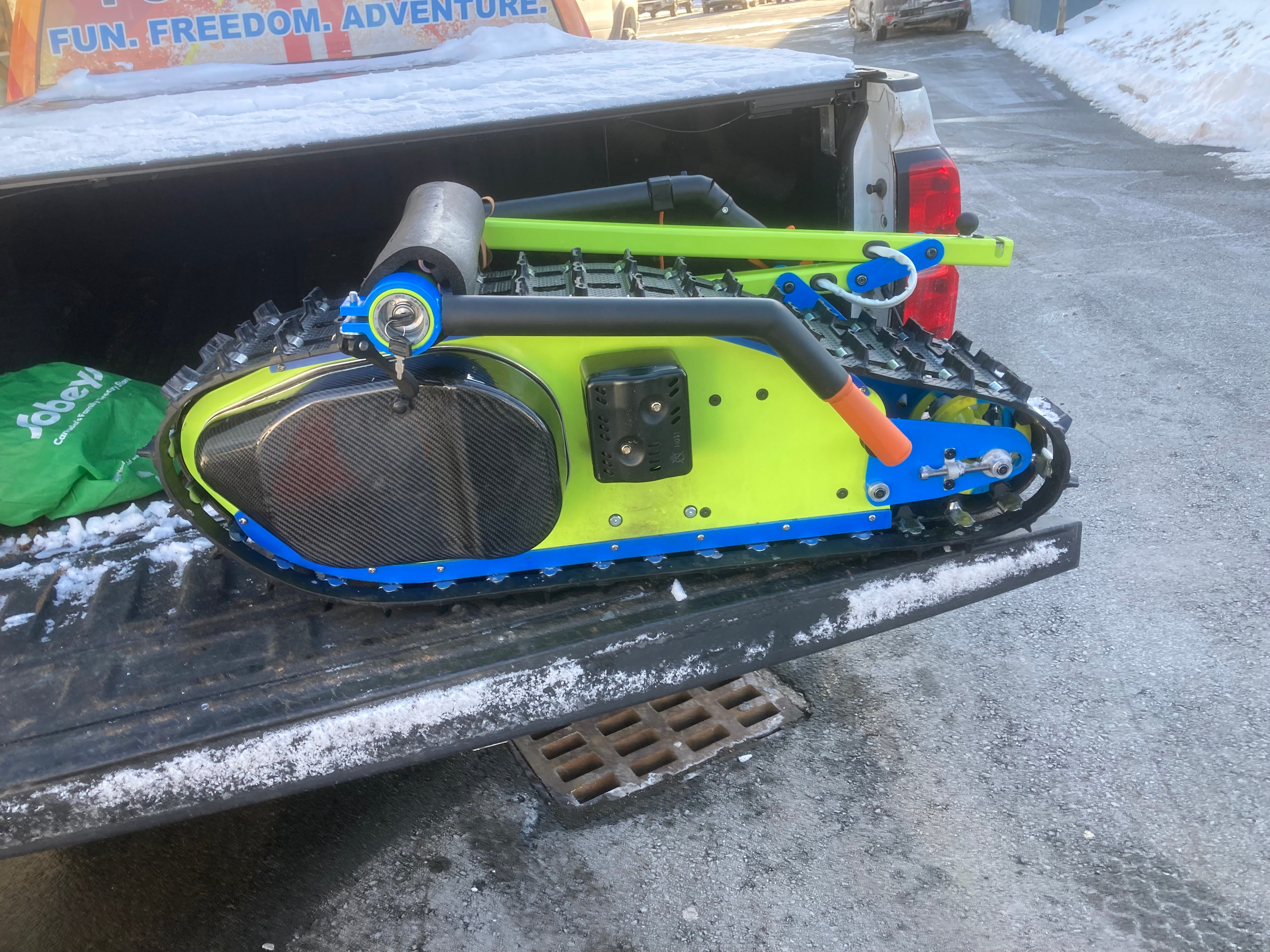Skizee powered skiing. No need for a hill. Ski or snowboard anywhere.