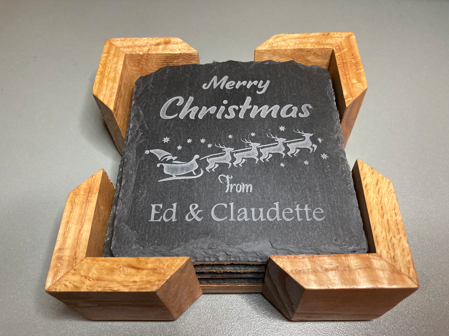 Personalized Merry Christmas Coaster. A great gift for the holidays. Get a set for entertaining guests.  Carved to a depth and quality that cannot be achieved with simple engraving.  Buy as a single, or mix and match in sets of 2 or 4.  Add a Coaster Holder and/or Gift Box. Each sold separately.