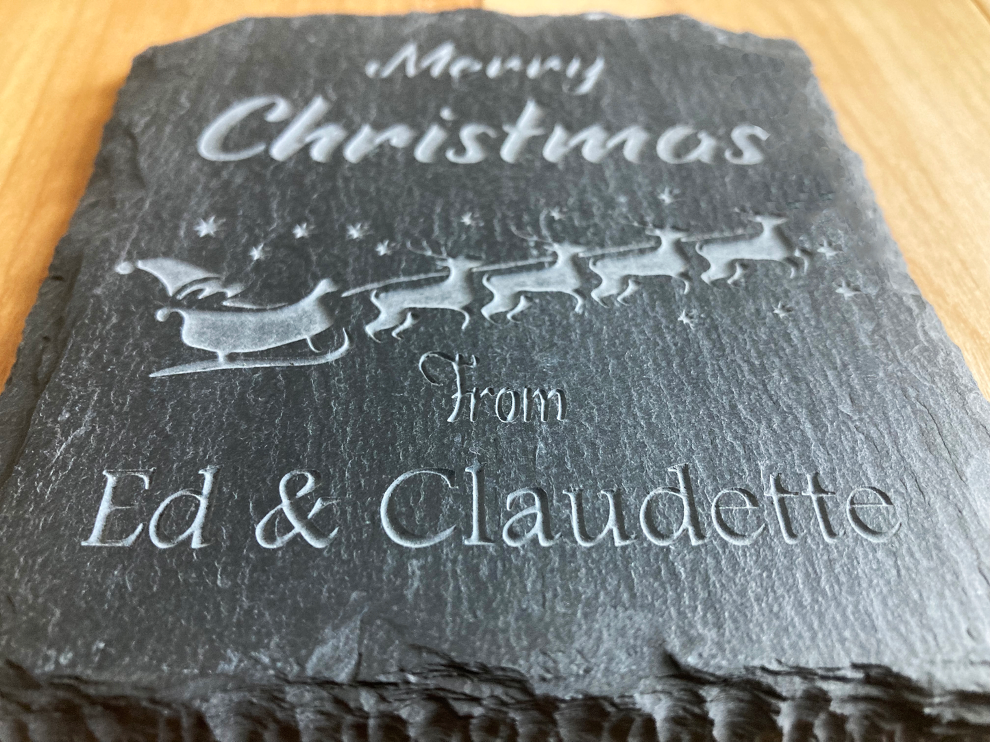 Personalized Merry Christmas Coaster. A great gift for the holidays. Get a set for entertaining guests.  Carved to a depth and quality that cannot be achieved with simple engraving.  Buy as a single, or mix and match in sets of 2 or 4.  Add a Coaster Holder and/or Gift Box. Each sold separately.